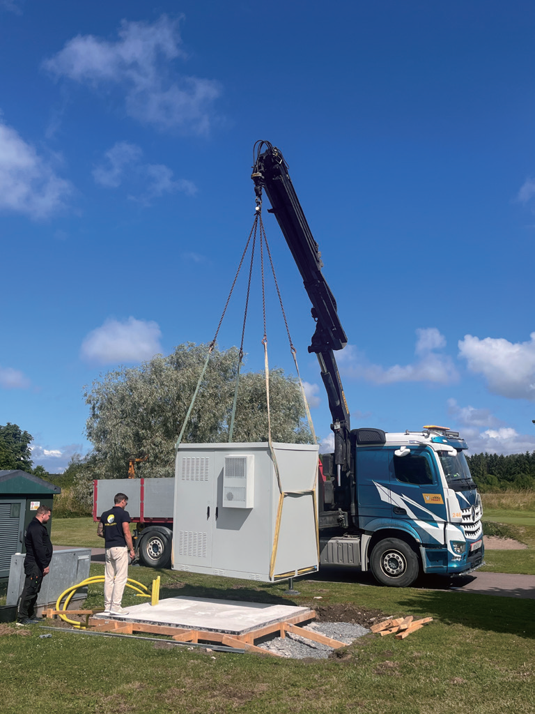 MINI-SUB BESS enclosure being delivered by crane truck